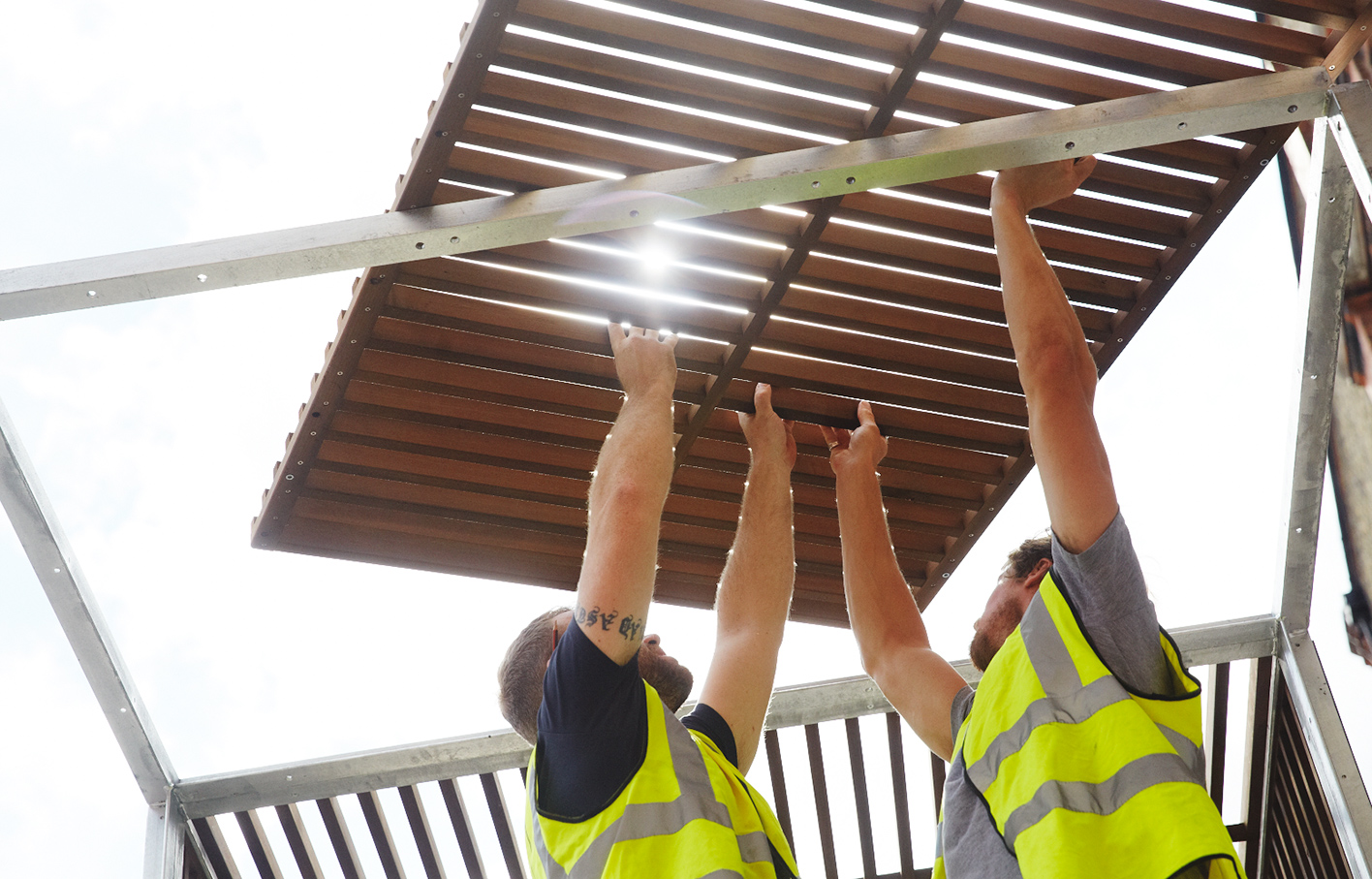 Aldworth James & Bond | Our site teams lifting a Chisenhale panel in to place